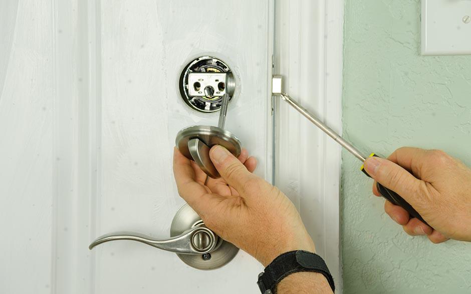 changer serrure porte garage basculante Bouc-Bel-Air